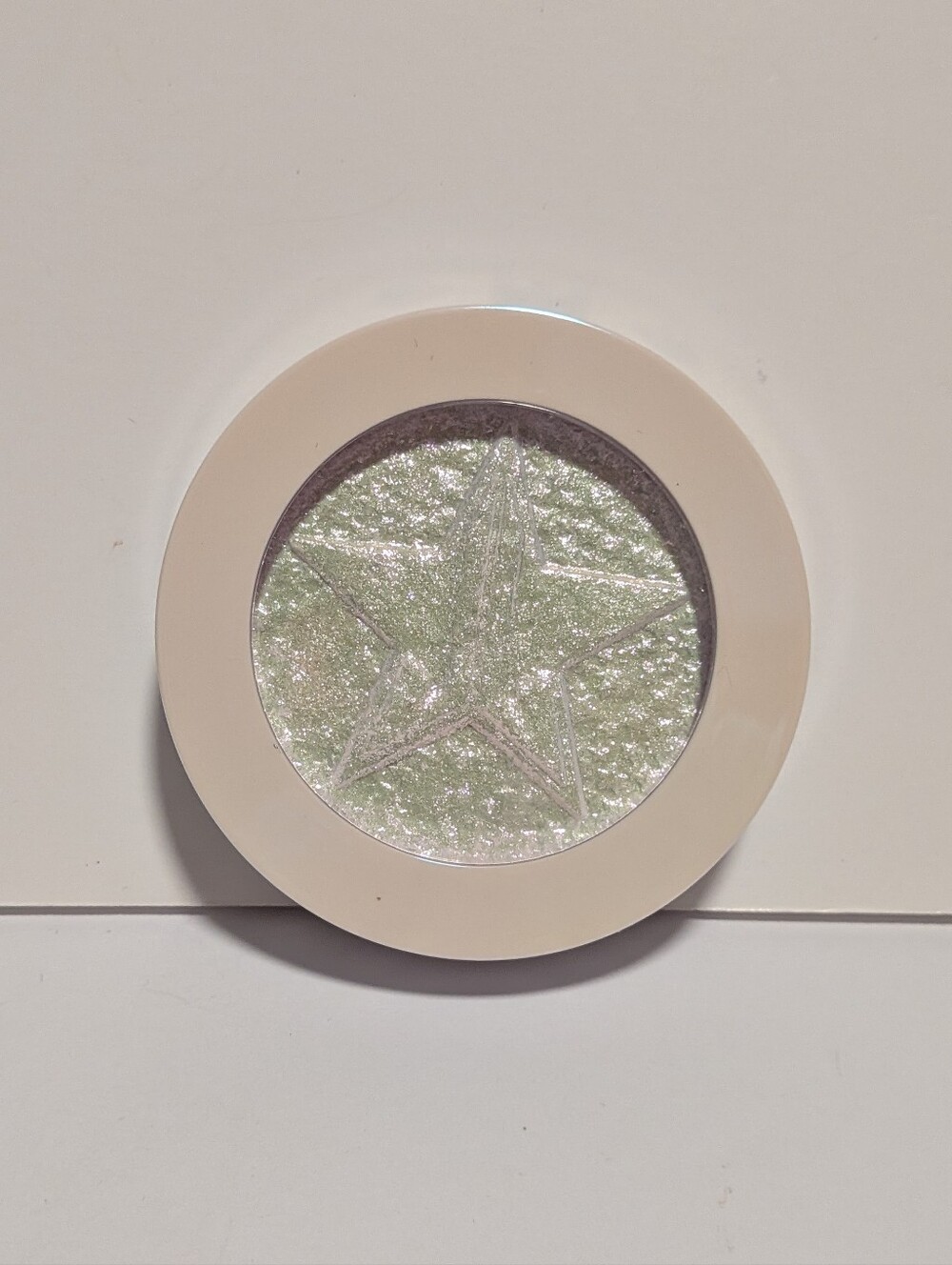Jeffree Star Cosmetics Extreme Frost highlighting powder in the shade